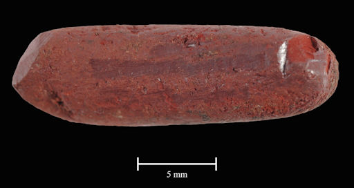 Photo Credit: Artsy.net, a piece of red ochre found near near Scarborough and fashioned into a Stone Age crayon. Courtesy of Paul Shields, University of York.